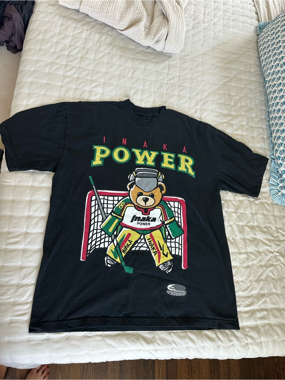 Inaka Power Black T‑Shirt with Multi‑Color Hockey Bear Graphic